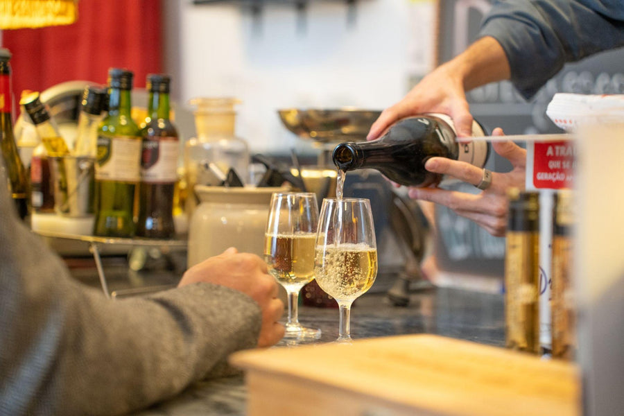 Pouring Portuguese white wine by the glass at POP, Lisbon